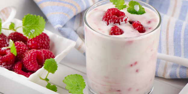 Raspberry yogurt with fresh  mint leaves