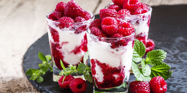 Raspberry ice cream, berries and mint, selective focus